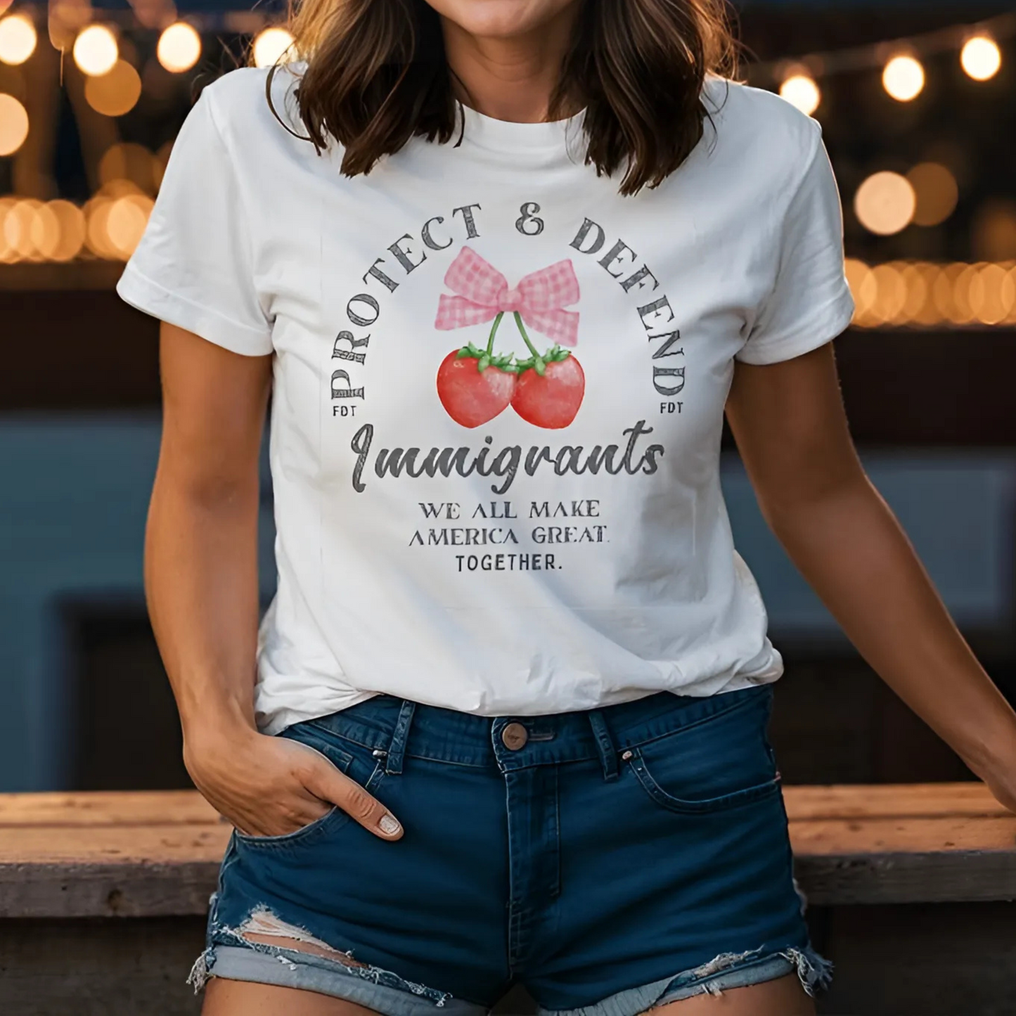 Support Immigrants: Protect and Defend Immigrants. We all make America great. TOGETHER. Orange Strawberries Bow Unisex WHITE T-Shirt